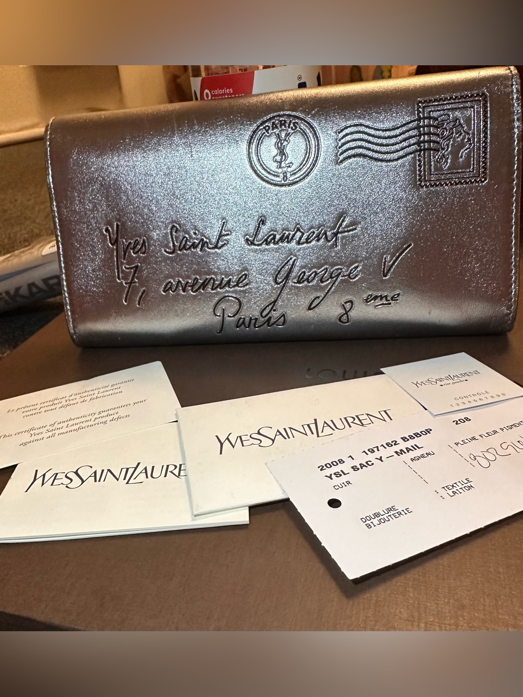 Yves Saint Laurent Metallic Silver Embossed Envelope Clutch